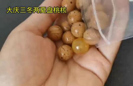 桃核手串华丽变身：手工制作的秘密